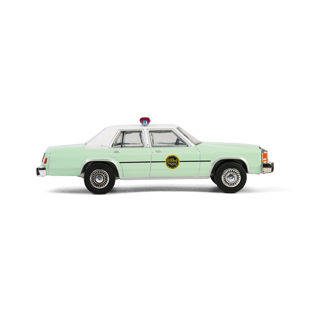 RAW CHASE 1983 Ford LTD Crown Victoria (Hot Pursuit Special Edition - U.S. Customs and Border Patrol) Diecast 1:64 Scale Model - Greenlight 43035B