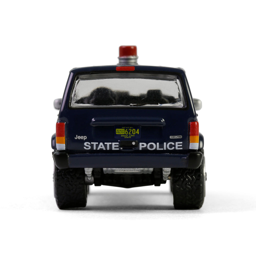 RAW CHASE 2001 Jeep Cherokee - Michigan State Police (Hot Pursuit Series 46) Diecast 1:64 Scale Model - Greenlight 43040E