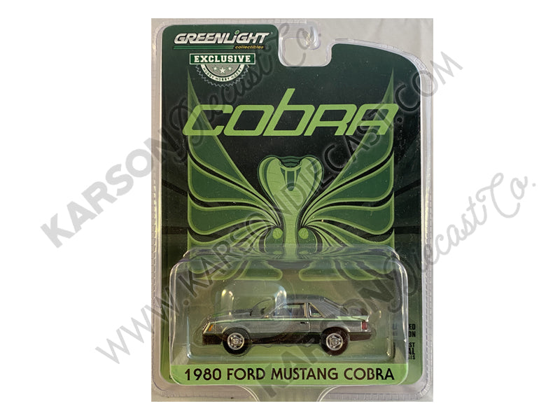 CHASE 1980 Ford Mustang Cobra Black with Green Cobra Hood Graphics and Stripe Treatment "Hobby Exclusive" 1:64 Diecast Model Car - Greenlight - 30228